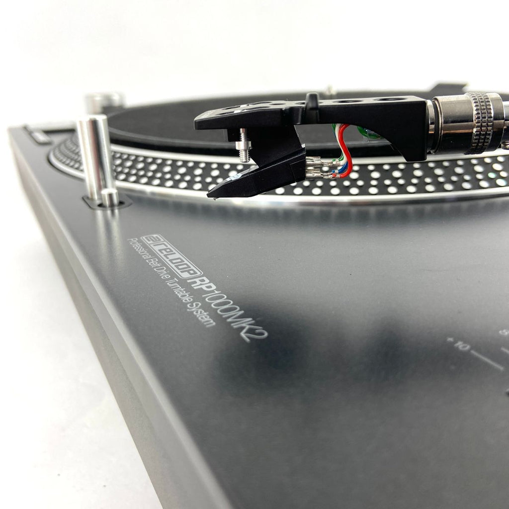giradischi con trazione a cinghia per dj o ascolto Reloop RP-1000 MK2 ex demo vista della testina